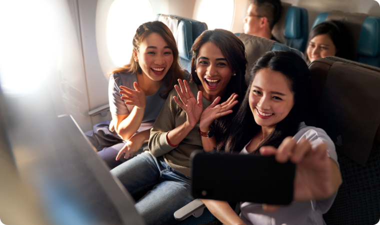 ladies selfie on plane